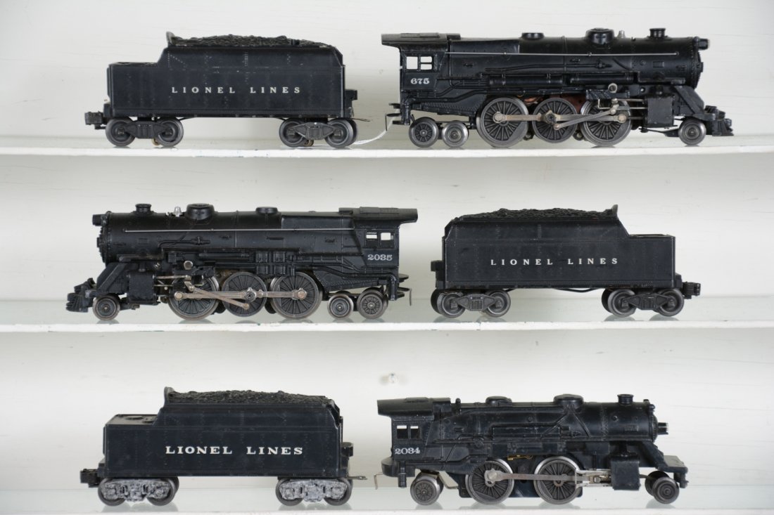 3 Lionel Locos with Tenders: Includes a late 675; 6466T with whistle; late 2035 with slight bend in cab corner, missing boiler front decal; 6466W tender; 2034 loco, missing both main rods; 6066T tender. All show moderate playwear