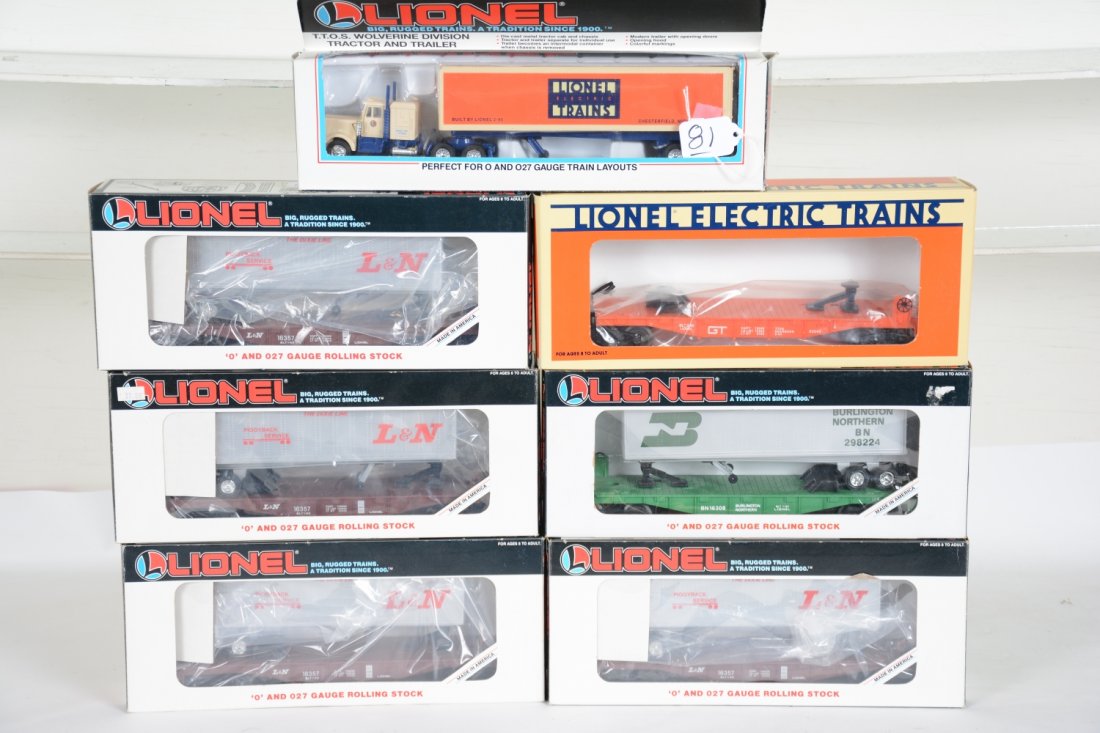 6 Boxed Lionel Trailer Flats: Includes 4 #16357 L&N; 52040 TTOS with 52033 tractor; 16308 Burlington. All appear unrun with boxes, C10