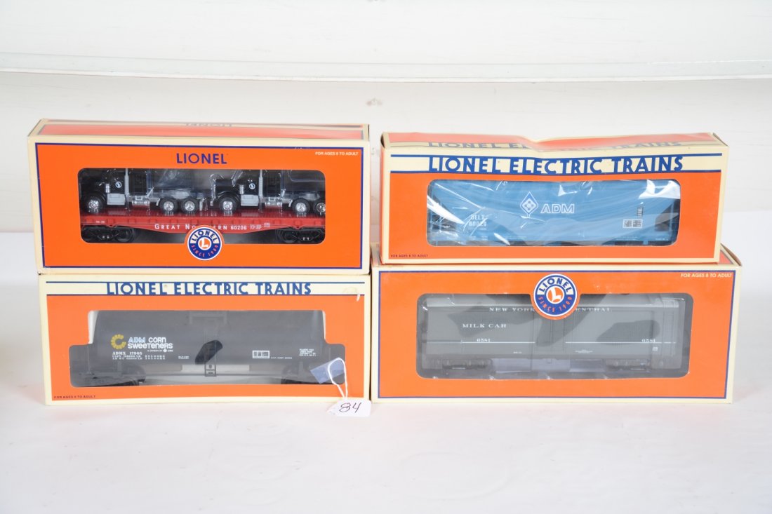 4 Boxed Lionel O Scale Freight Cars: Includes 17905 Archer unibody tank; 27561 GN flat with semis; 173490 NYC milk car; 17118 Archer 3-bay hopper. All appear unrun with boxes, C10