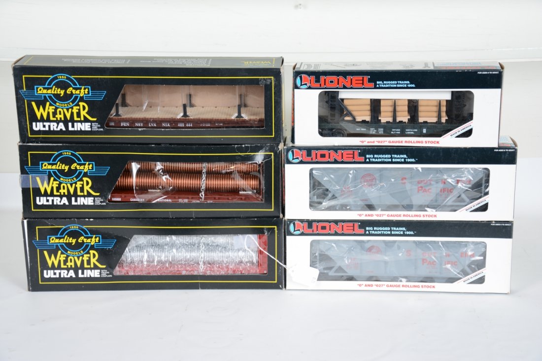 6 Lionel & Weaver Freight Cars: Includes Weaver 96152 SF flat with pipes; 685000 CN flat with pipes; 469444 PRR flat car, missing load; Lionel 16347 ON lumber car; 2 #19311 SP covered hoppers. Most are unrun with boxes, C9-10