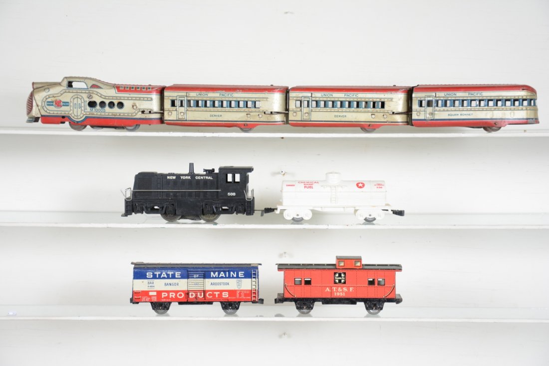 2 Marx Sets: Includes an M10005 UP diesel; 2 Denver coaches; Squaw Bonnet observation; 588 NYC diesel; tank; boxcar & caboose. All show moderate playwear, C5-6