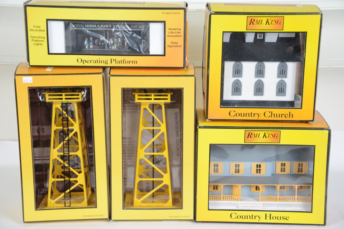 5 MTH RailKing Accessories: Includes 30-9107 operating passenger station; 2 #30-9025 floodlight towers; country home & church. All show light use with boxes, C8+-9