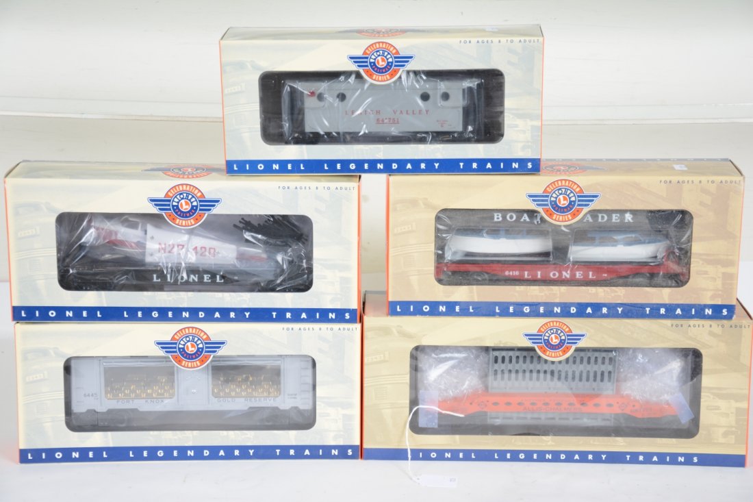 5 Lionel Celebration Series Cars: Includes 19790 6417-50 LV caboose; 19428 -6816 boat loader; 29462 -6500 airplane; 36088 -6819 Allis-Chalmers; 19688- 6445 Fort Knox gold car. All are mint in boxes, C10