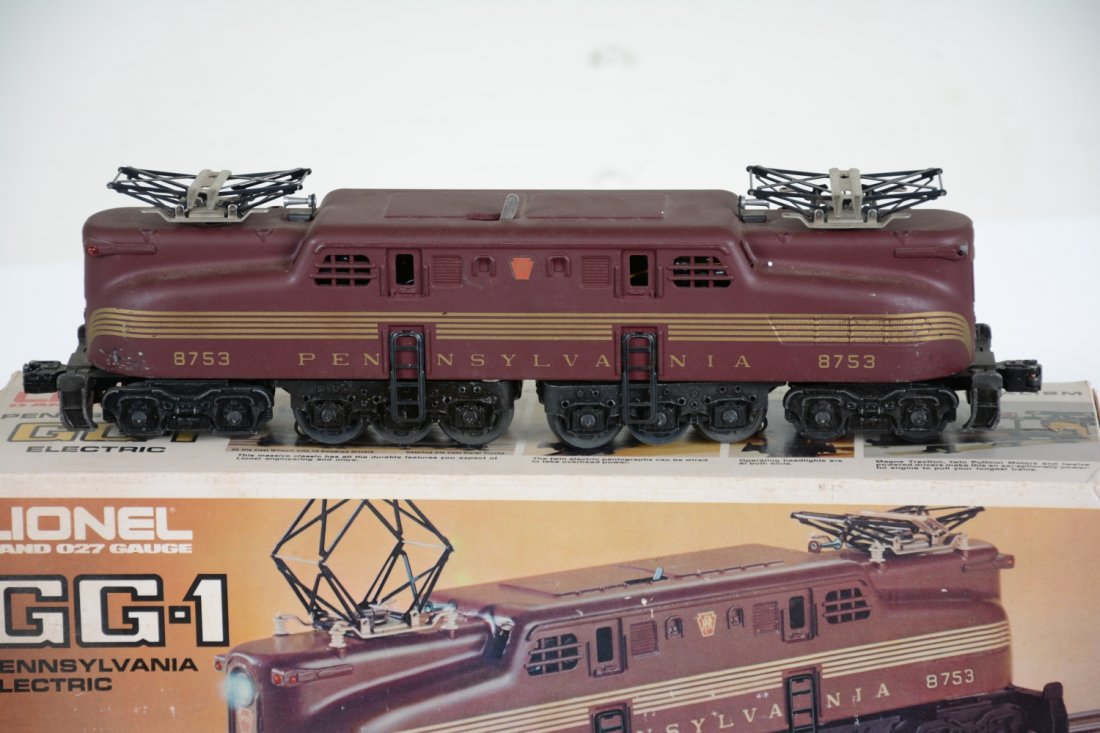 Lionel 8753 PRR GG1 Electric: Clean dual motor GG1. It is missing it's pantograph insulators and 2 marker light lenses. It shows light to moderate playwear with box & insert, C6+-7
