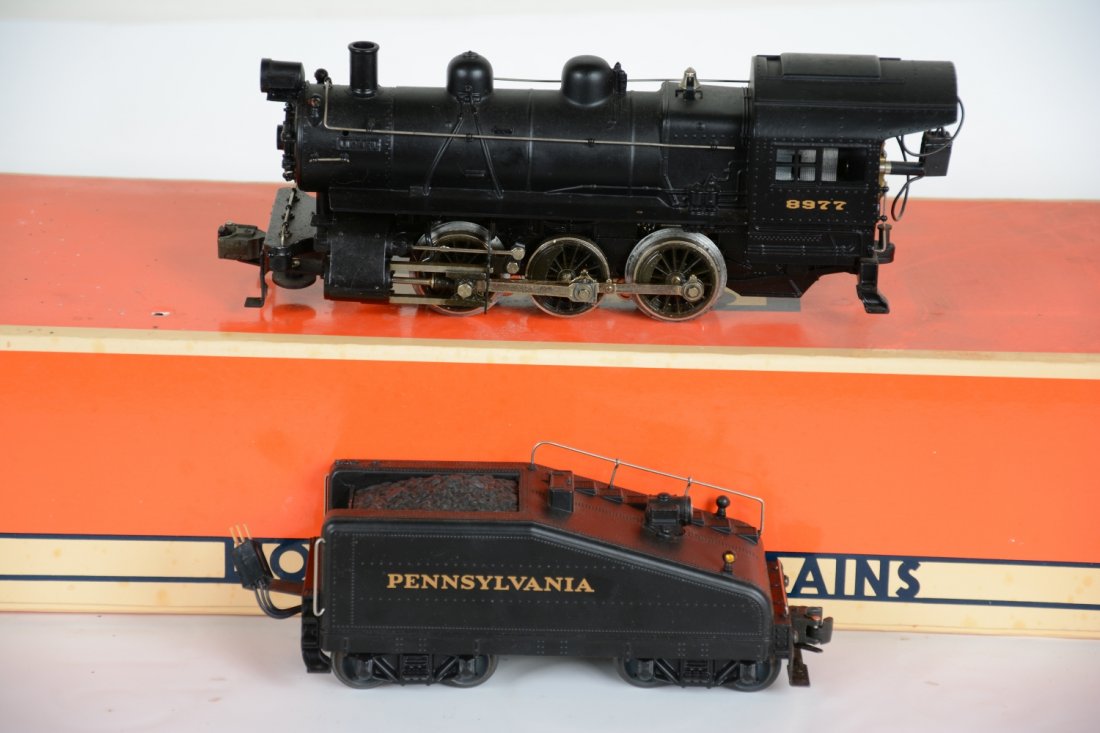 Lionel 18000 PRR B6 Switcher: Nice reissue of Lionel's semi scale switcher. It is equipped with RailSounds, smoking stack & chests, back-up light & more! It shows light runtime with C9 body & box.