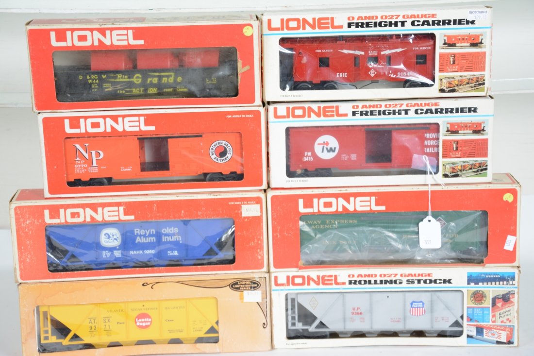 8 Boxed Lionel Freight Cars: Includes 9770 NP boxcar; 9371 SCL hopper; 9260 Reynolds hopper; 9863 REA reefer; 9424 TPW boxcar; 9366 UP hopper; 9184 Erie baywindow caboose; 9144 DRG gondola. Some show light runtime, others mint wi