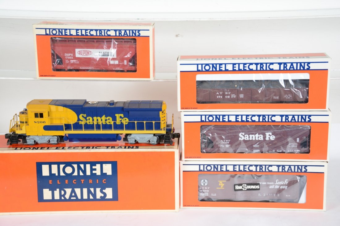 Partial Lionel AT&SF Set 11713: Includes an 18206 SF Dash-8 40B diesel, dual motors with strobe light; 17202 SF boxcar with RailSounds; 17402 SF Gondola with coal; 17003 DuPont center flow hopper; 17108 SF Center flow hopper. All sh