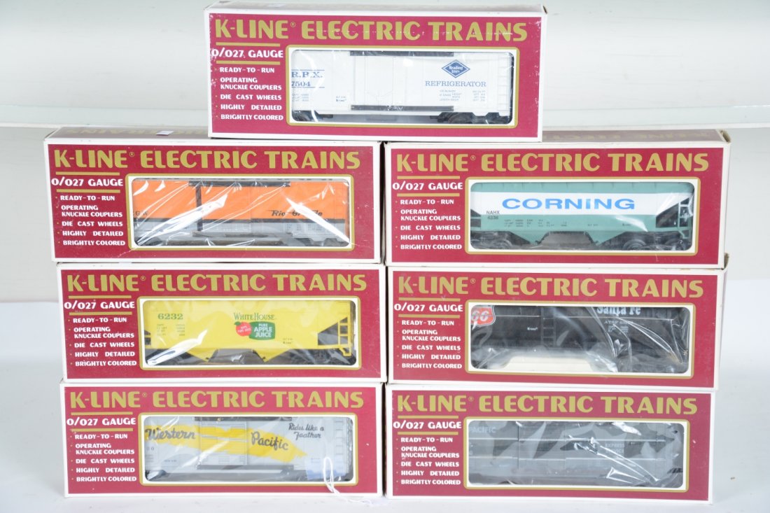 7 K-Line Freight Cars: All are Classic cars with metal sprung trucks- K6436 WP boxcar; 6232 Whitehouse hopper; Phillips tank car; Corning hopper; 6441 RG boxcar; UP express boxcar; 7504 Reading reefer. All are unrun with bo