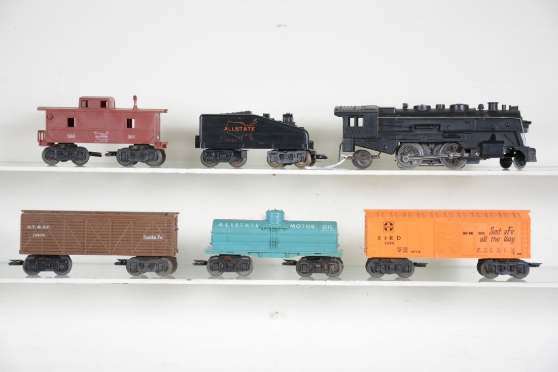 6Pc Marx Allstate Steam Freight Set: Includes a 1666 steam loco with smoke; Allstate slant back tender; SF boxcar; Allstate tank; SF stock car; 564 Allstate caboose. All have deluxe trucks and show light playwear, C7-8