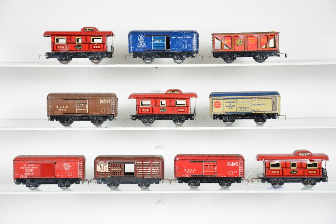 10 Tin Marx Freight Cars: Highlights include brown B&LE boxcar; red Saw boxcar; blue B&O boxcar; red B&O boxcar, plus 6 others. They are clean, but grade range is C3-7, so examine photos closely.