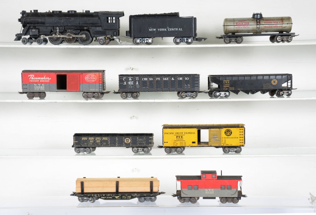 10Pc Marx 3/16 Freight Set with Whistle: Cool Huh? Includes a 333 cast Hudson with matching cast NYC tender with added whistle unit; NKP lumber flat; PFE reefer; LNE hopper; C&O high gondola and 4 others. Grade range is C5-7, so examine phot