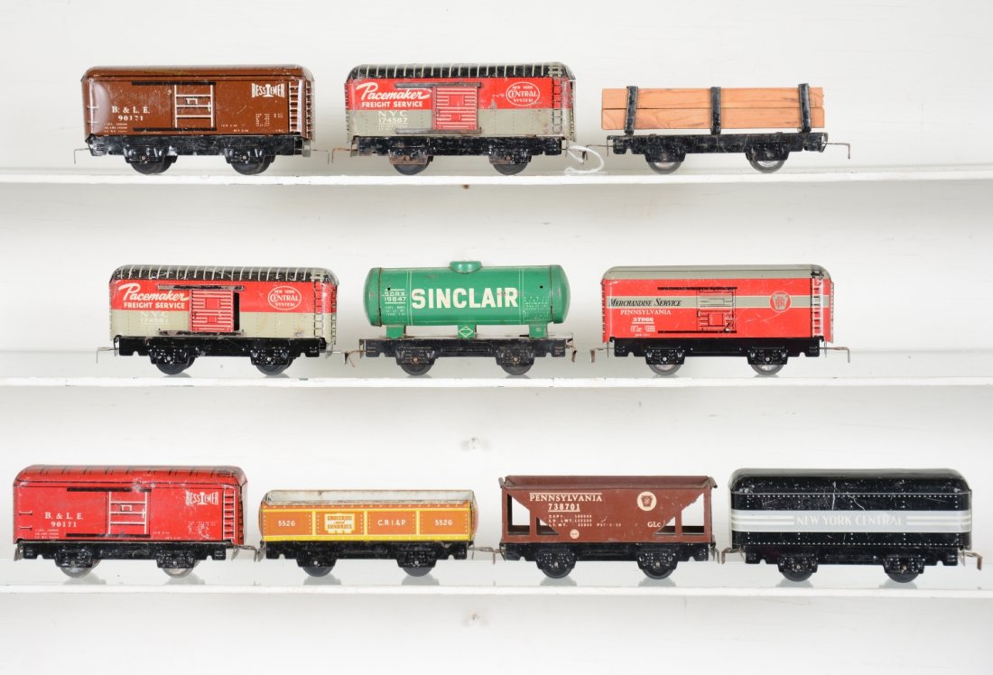 10 Marx Tin Freight Cars: Includes 2 NYC boxcars, C5; 552g gondola; red & brown B&LE boxcars; lumber flat. Rest show light to moderate playwear, C6-7