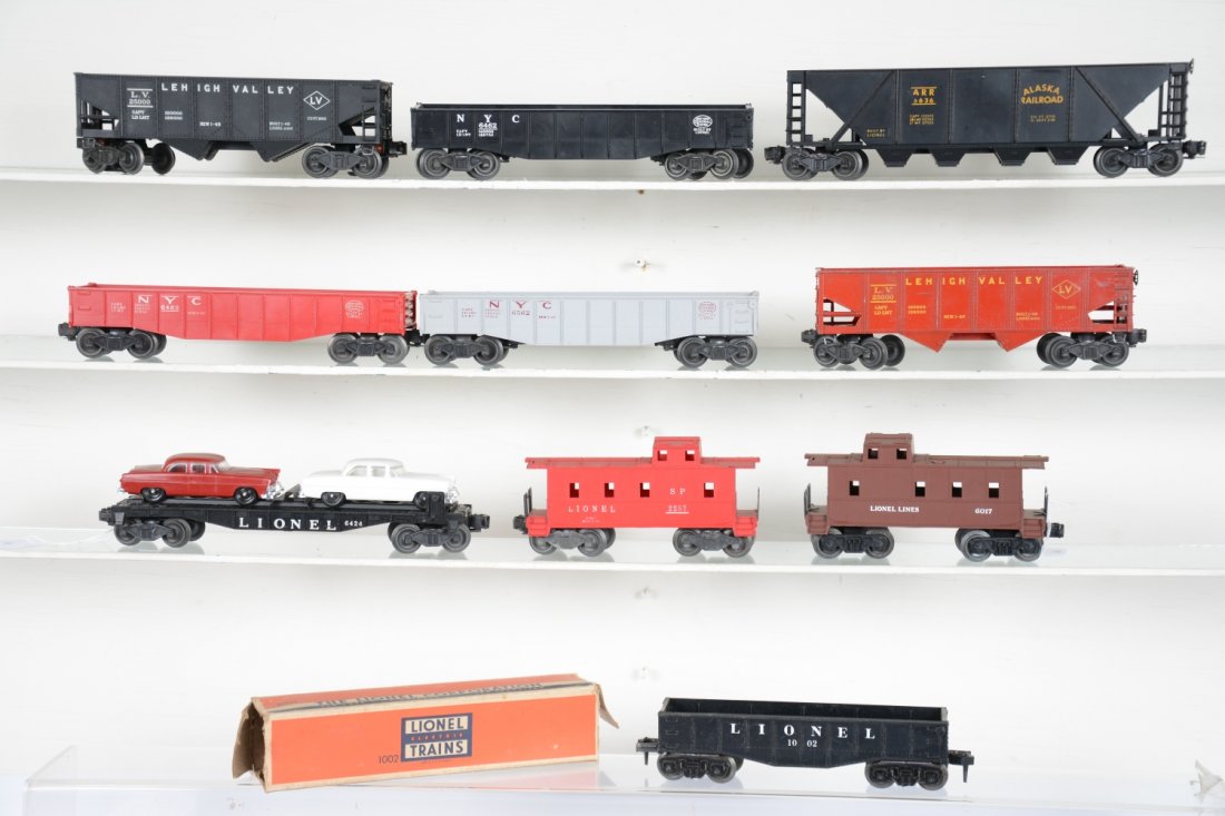 Clean Lionel Rolling Stock: Includes 6456-75 gloss red hopper, C5; 6636 Alaska hopper, metal trucks; 6424 auto-loader, repro cars; 1002 gondola, rough ob; 2257 caboose; 6017 caboose; 6562 gondola; 6462-125 gondola; 6462 gondola;