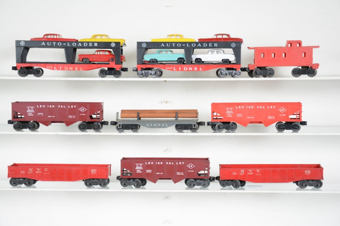 Clean Lionel Rolling Stock: Includes 2 #6456 hoppers; 6476 hopper; 6111 log flat, replaced logs; 2 #6462-25 gondolas; 2 #6414 auto-loaders, 1 has repro cars, other has 2 original, but incomplete cars; (6167) caboose. Rest show l
