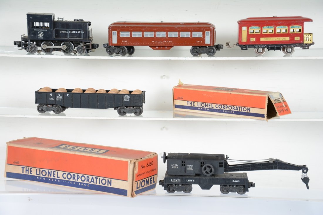 5Pc Lionel Group: Includes a boxed 6460 crane with late boom; boxed 6462 gondola with drums; 6442 Pullman; 41 US Army switcher, struts cracked, but present. All show moderate playwear, otherwise C5+-6+; Prewar 630 obse