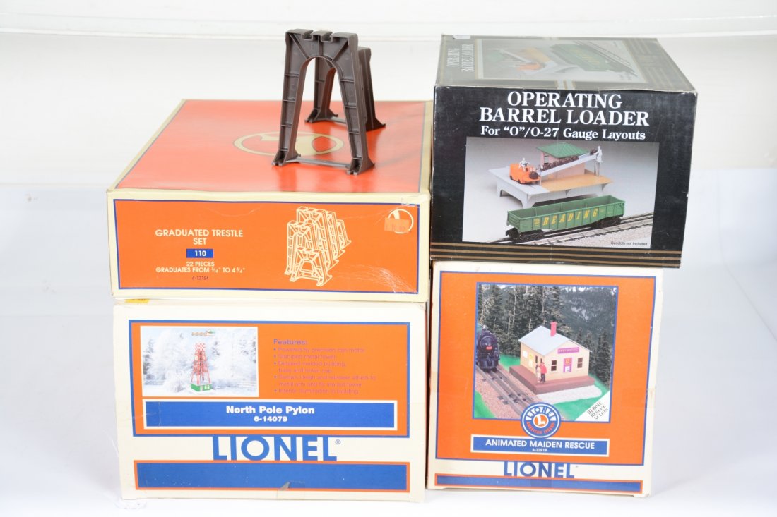 4 Boxed Lionel K-Line Accessories: Includes a Lionel 14079 Santa Pylon; 32919 Maiden Rescue; 12754 trestle set; K-Line Barrel loader. All appear mint with boxes, C10