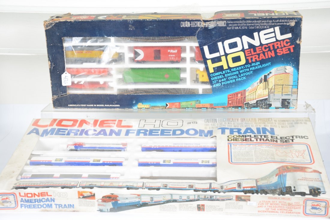 2 Lionel HO Train Sets: Includes an 08125 Freedom train set; 1481 UP diesel Freight set. They appear new in shop worn boxes, trains C9