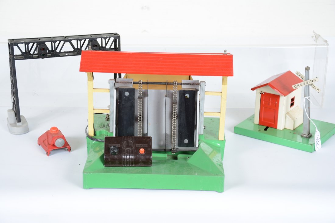 4 Lionel Accessories: Includes a 164 lumber loader, rewired controller, replaced roof; 450 signal bridge; 45N gateman; 260 bumper. Otherwise show light to moderate playwear, C6-7