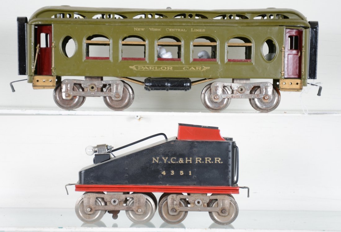 2 Restored Lionel Early Pieces: Standard gauge. Includes a 18 Pullman, restored minus window material; well done customized 5T tender with back-up light.