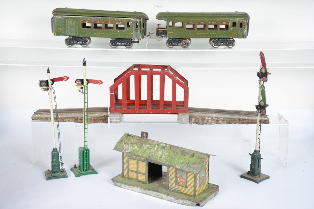 Ives Car & Accessory Lot: Standard gauge. Includes a 185 Pullman, roof loose; 186 observation; 2 semaphores, 1 restored; double semaphore, missing light caps; 115 Freight station, roof & base heavily flaking; 3-pc bridge. Grad