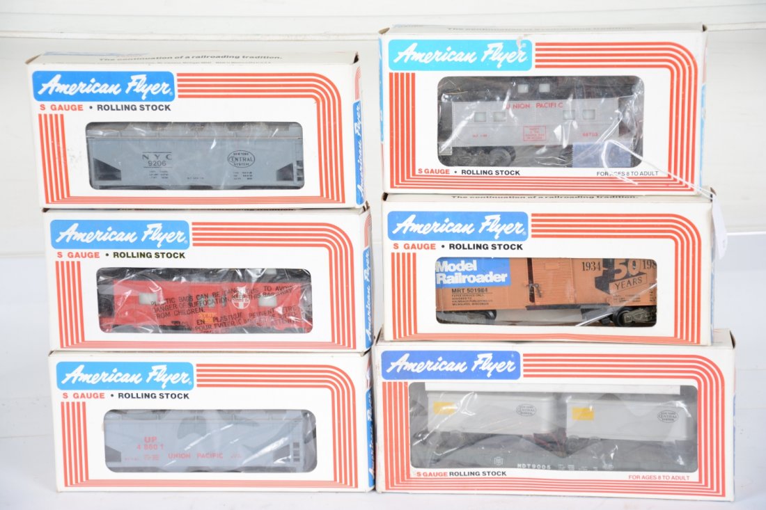 Lionel-American Flyer Freight Cars: S Gauge. Includes a 48703 UP caboose; 9005 NYC van flat; 48601 UP hopper; 9206 NYC hopper; 9405 SF bay window caboose; 501984 MR 50th Anniv. boxcar. All are unrun with boxes having light basement smel