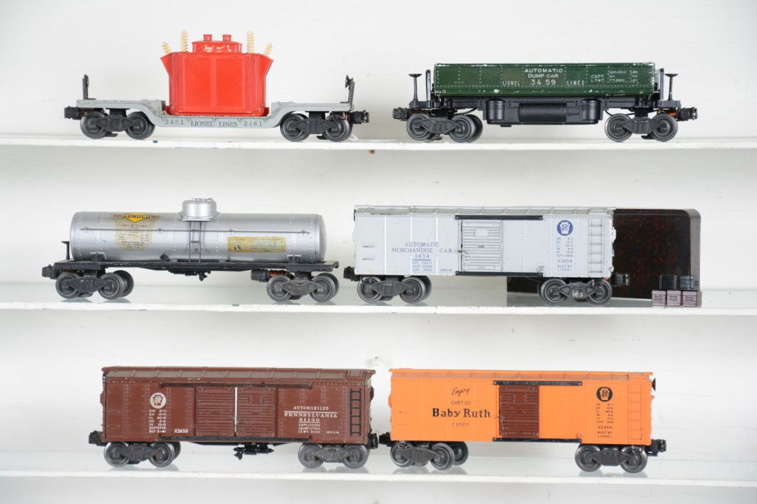 Early Lionel Freight Cars: Includes a 2555 Sunoco tank car, fairly clean light decals, clean silver; 2454 BR boxcar; 2458 PRR boxcar; 3454 operating merchandise car with 4 cubes and mottled tray; 3459 coal dump, C6-; 2461 flat