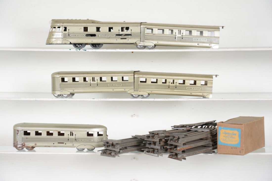 American Flyer 9900 Tin Zephyr Streamliner: Circa 1937. Includes an electric 9900 diesel; 3 coaches and an observation. Also includes track & boxed transformer. It is clean, showing moderate playwear, C6