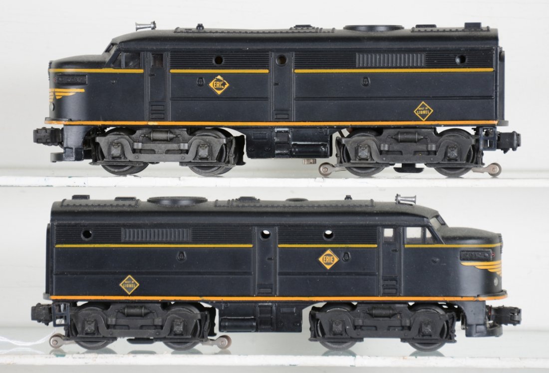 Clean Lionel 2032 Erie Alco AA Diesels: Nice matte patina with 90-% decals overall. Battery box is clean. One nose decal has some touch-up. It shows light playwear, C7ish