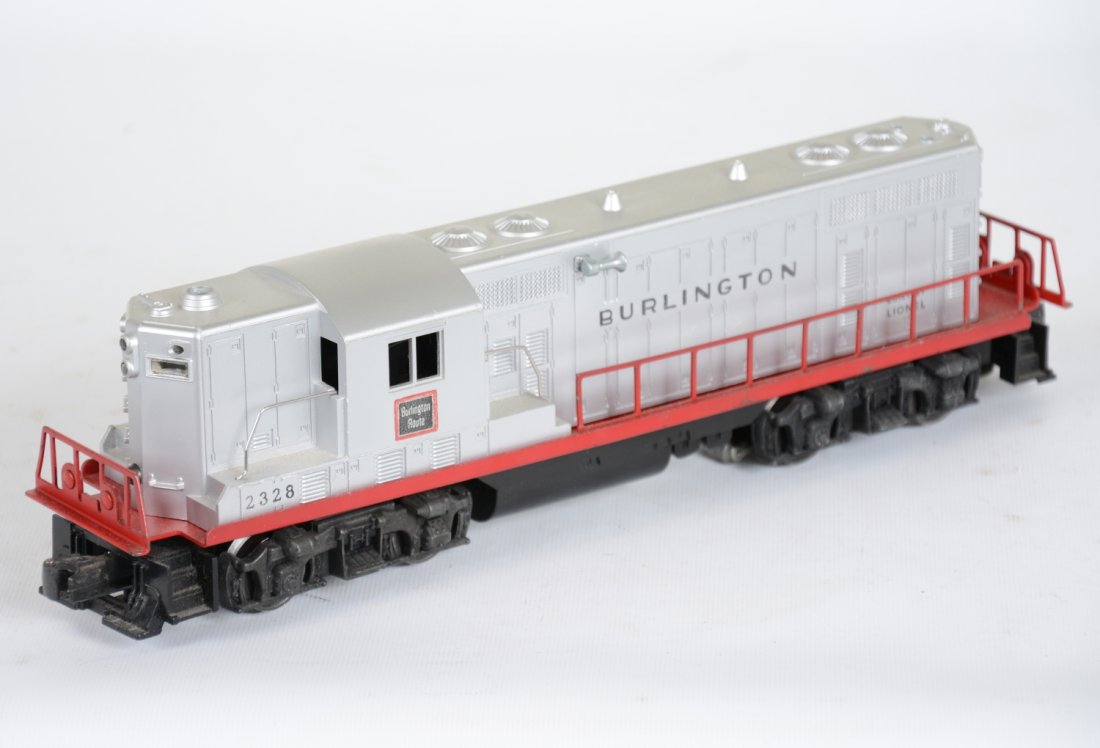 Clean Lionel 2028 Burlington GP7 Diesel: Nice lettering with bright even silver. Battery box appears clean and it shows light to moderate playwear, C7
