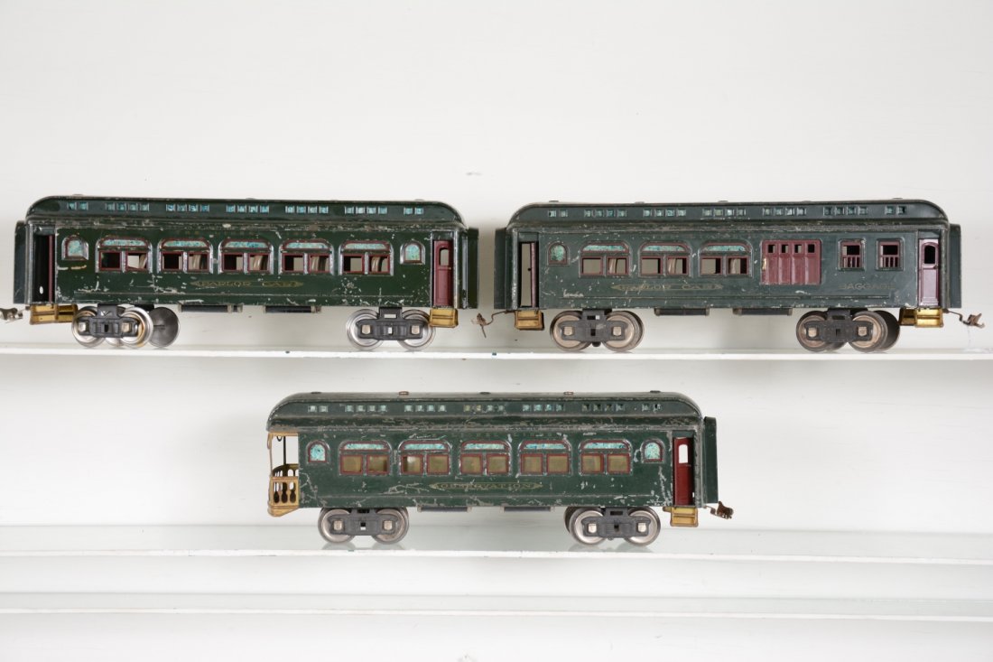 Lionel 420 Passenger Cars: ST Gauge. Includes a 429 combine; 428 Pullman, missing 1 coupler assembly; 430 observation. They have readable lettering and show moderate to heavy playwear, C4