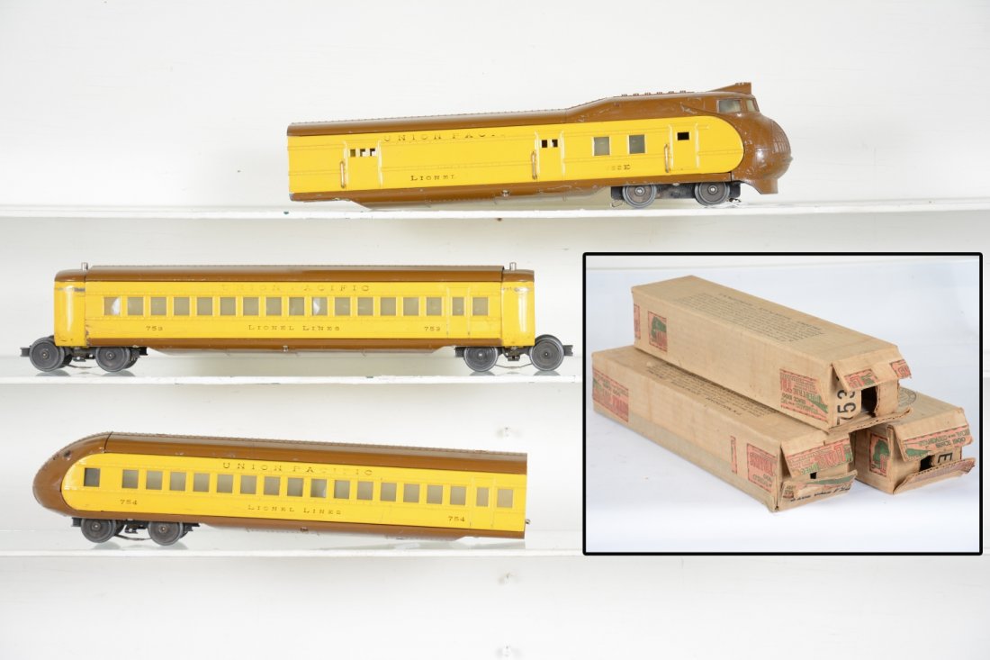 Boxed Lionel 752 City Of Portland Streamliner: 072. Includes a 752E diesel, light fatigue to wheels, some lettering missing, C5; 752 coach; 754 observation. All are clean & shiny with straight bellies & boxes, C6