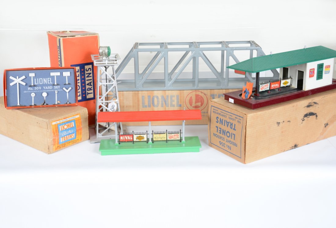 Boxed Lionel Accessories: Includes a 156 station platform; 309 sign set, both C8; 494 beacon; 356 operating Freight station with carts; 317 trestle bridge, C6-. Rest show light to moderate playwear, C7