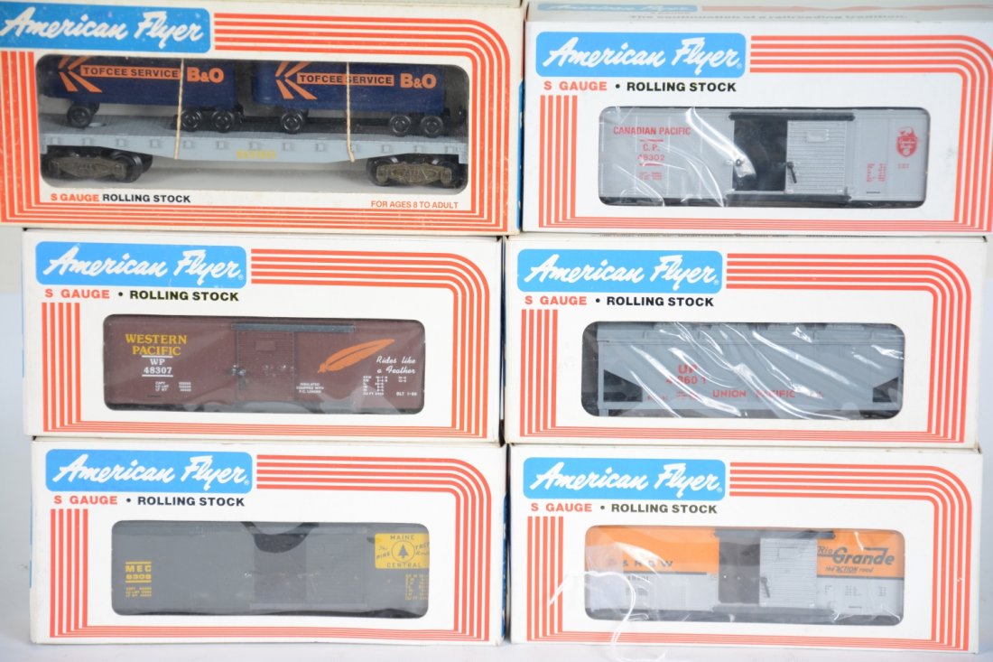 Lionel American Flyer Freight Cars: S Gauge. Includes 48308 MC boxcar; 48307 WP boxcar; 9000 B&O flat with vans; 48301 DRGW boxcar; 48601 UP hopper; 48302 CP boxcar. All are new in boxes, C10