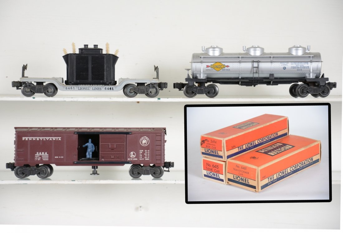3 Clean Boxed Lionel Freight Cars: Includes a 6461 flat with transformer, has box insert; 6415 Sunoco tank car; 3494 PRR operating boxcar. All show light playwear with boxes, C8