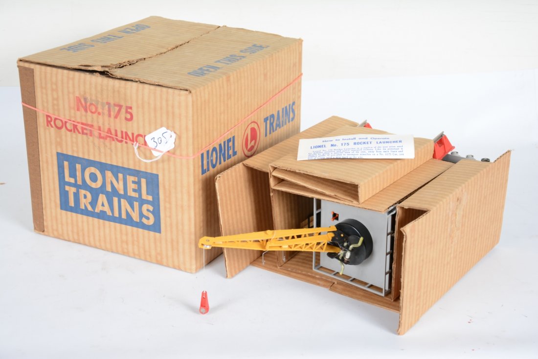 NMint Lionel 175 Rocket Launcher: This is a near flawless example, just missing the rockets foam tip. The inserts are crisp with nice original box that had been re-sealed, so glue residue on inner flaps, C9 WOW!