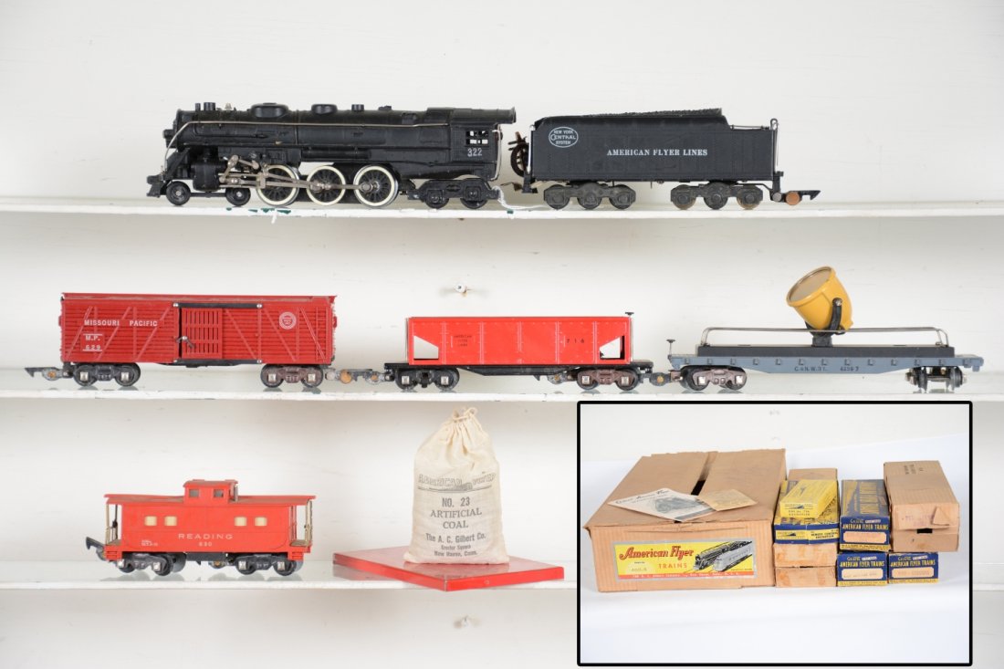 Boxed American Flyer 322 Set 4611-A: S Gauge. Includes a 322 NYC Hudson loco, smoke in boiler version; 716 dump car with Rare red bin & 23 coal; 634 searchlight, small rust spot one side; 629 MP stock car; 630 caboose. All have boxes wit