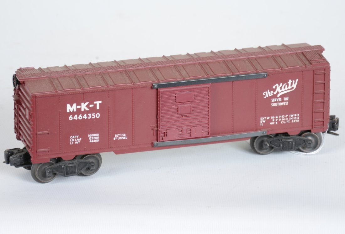 Clean Lionel 6464-350 MKT Boxcar: Type IIB with awesome matte patina, but has a yellow paint spot one lower corner. It shows light runtime, C8ish