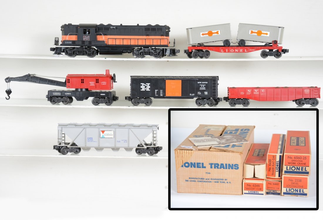 Boxed Lionel 2338 Diesel Set 706: Clean 1957 set. Includes a 2338 MR GP7 diesel. Tougher variation, orange & black painted on orange mold. Has nice matte patina with a few minor box rubs & clean battery box; 6464-425 NH boxcar, type I