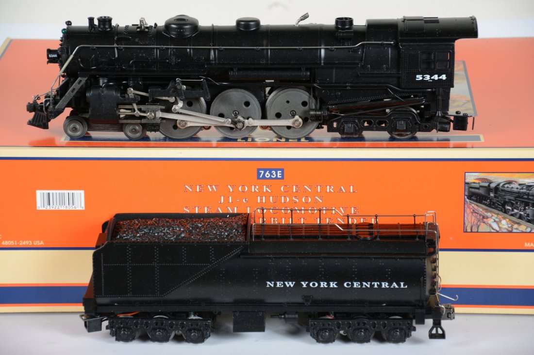 Lionel 18056 Scale 763E Hudson Locomotive: Nice reissue of Lionel's Iconic 763, now with scale details and cast Vanderbilt tender. It is equipped with Command; RailSounds 2.5; directional lighting and more. It shows light runtime with near per