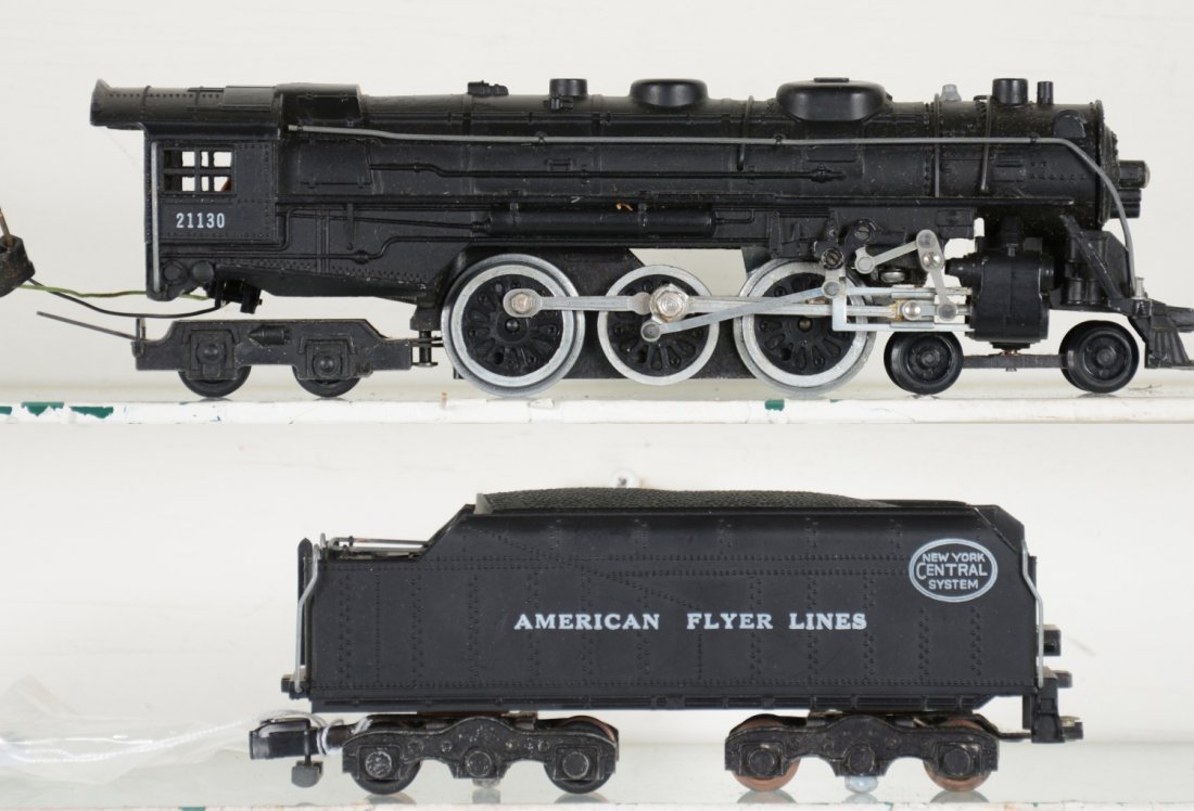 American Flyer 21130 NYC Hudson Locomotive: S Gauge. Scarce piece that is clean with bright lettering and rods. Plug-in tender does have 2 loose front steps, pieces included. It only shows light playwear, otherwise appears C8. Tough.