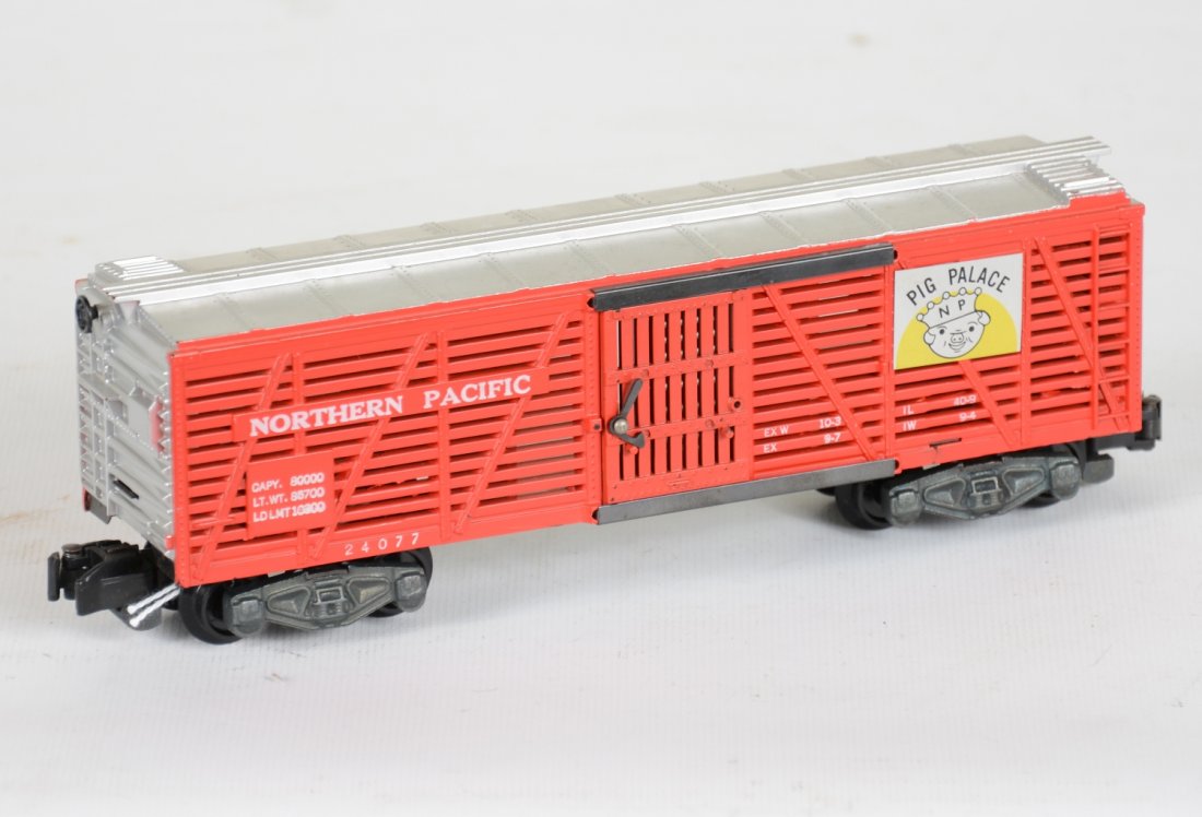 Nice American Flyer 24077 Pig Palace Stock Car: S gauge. Clean with nice lettering and bright silver paint. It shows very light use, just missing the latch nibs, otherwise C8 Nice.