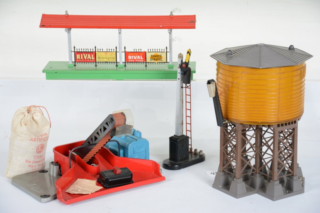4 Lionel Accessories: Includes a nice 397 coal loader with 206, 364c & inspection label; 30 water tank, intact with 96c; 156 station platform, C6; 151 semaphore. Rest show light to moderate playwear, C7-7+