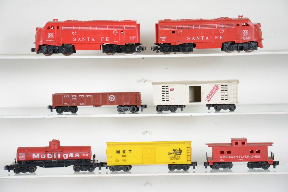 American Flyer 21206 SF AA Diesel Freight Set: S Gauge. Includes a 21206 SF F9 AA diesels, nose stickes 93%, dummy has a repaired tab crack; 24057 Mounds boxcar; 24316 Mobilgas tank; 24106 PRR gondola; 24030 MKT boxcar; 24636 caboose. All show lig