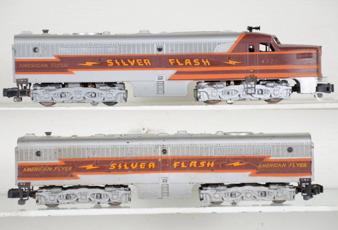Clean American Flyer 477 & 478 Silver Flash Diesels: S Gauge; Nice dual motor a power unit with 478 B-unit. B has light crazing to brown strips, otherwise both show light to moderate playwear, 2 steps show oxidation, C6-6+