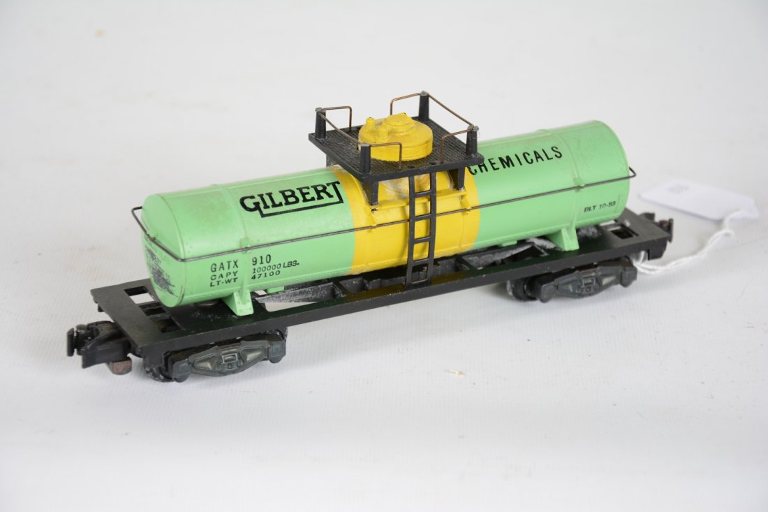 Nice American Flyer 910 Gilberts Tank Car: S Gauge. Fairly clean with crisp lettering. Light mildew underneath, but easy to clean. It shows light playwear, C8 Nice example!