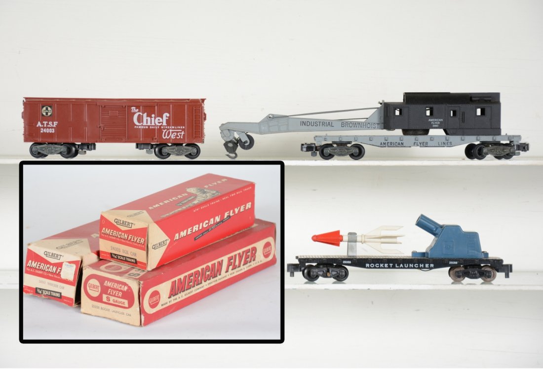 Boxed American Flyer 25059, 24561 & 24003: S Gauge. Includes a 25059 rocket launcher, missing brake wheel; 24003 SF boxcar, C9; 24561 crane. All are clean with boxes, Rest C7