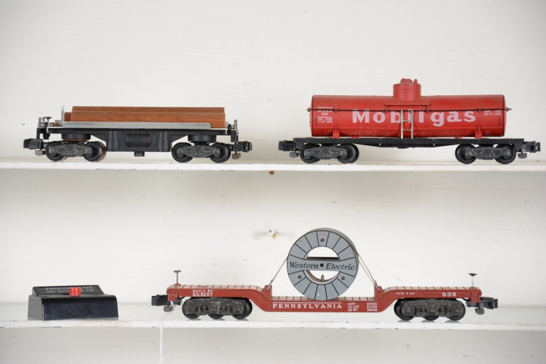 Clean American Flyer 936, 958 & 914 Freights: S Gauge. Includes a 936 Western electric reel car; 958 Mobilgas tank car; 914 log dump car with controller. All are clean, showing light playwear, C7-7+