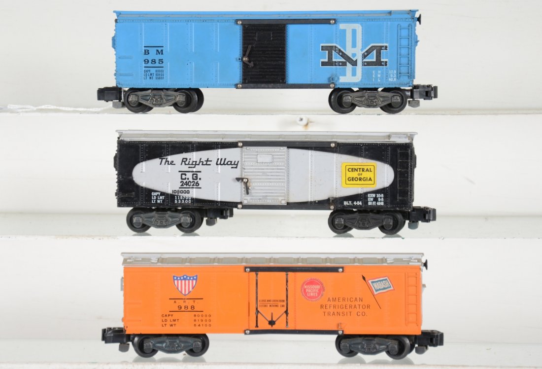 American Flyer 988, 985 & 24026 Freights: S Gauge. Includes a 988 ART reefer, C7+; 985 B&M boxcar, small chip in catwalk end, otherwise C7; 24026 C of G boxcar, missing 1 latch nib, nice stickers, C6