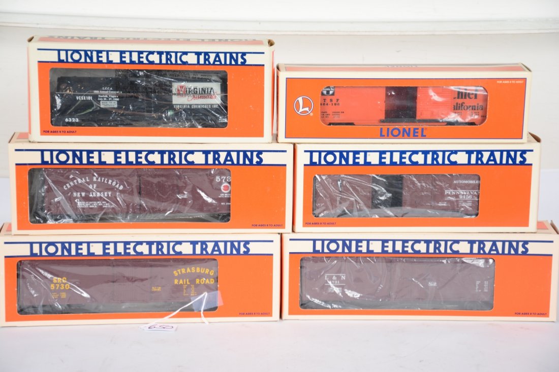 Lionel Freight Cars: Includes 6323 LCCA tank car; 5732 JC reefer; 5730 Strasburg reefer; 5731 L&N reefer; 9456 PRR boxcar; 19282 SF boxcar. All appear like new with boxes, C9-10