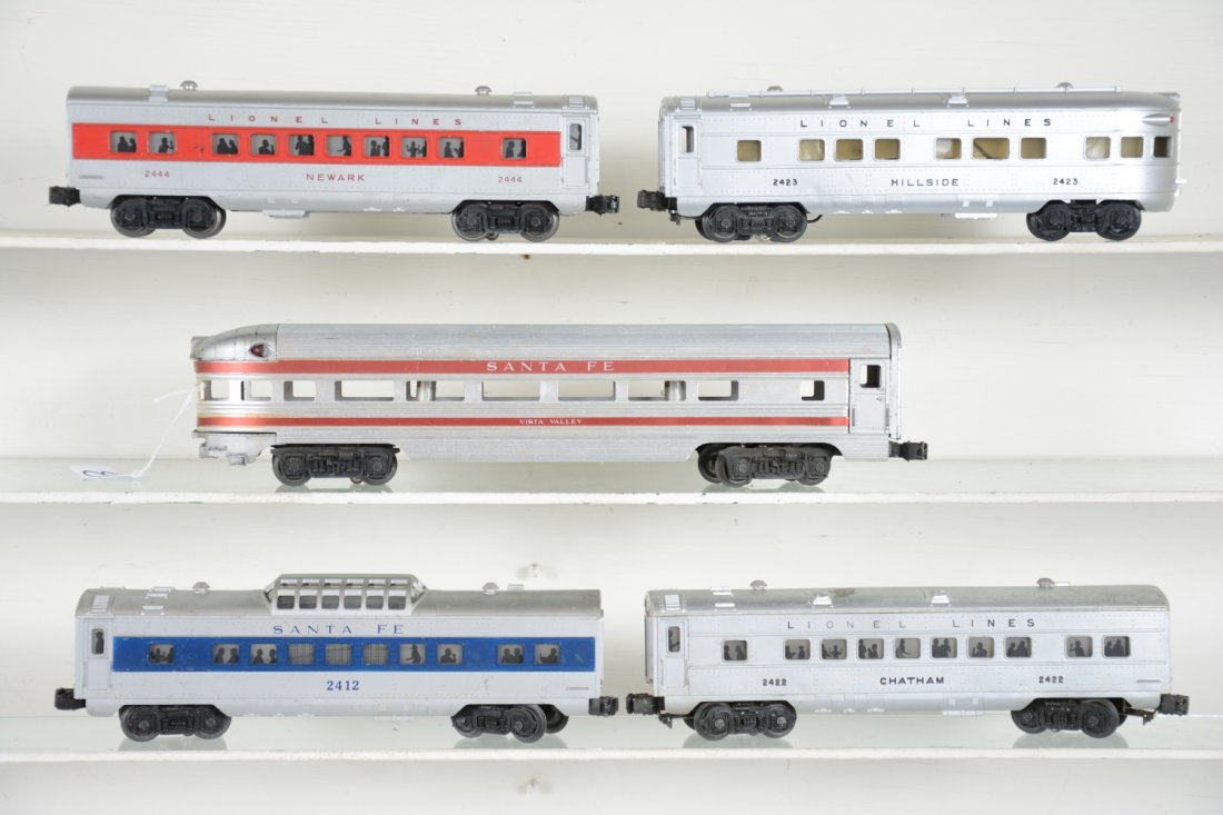 Lionel Passenger Cars: Includes 2561Vista Valley observation, missing window inserts and rear door, C5; 2444 Newark Pullman, C7; 2423 Hillside observation, C7; 2422 Chatham Pullman, roof C3, sides C6; 2412 SF vista-dome, C6